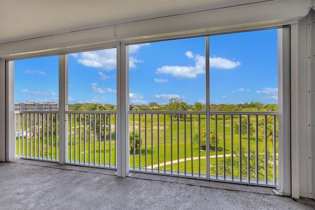 unfurnished sunroom with a healthy amount of sunlight