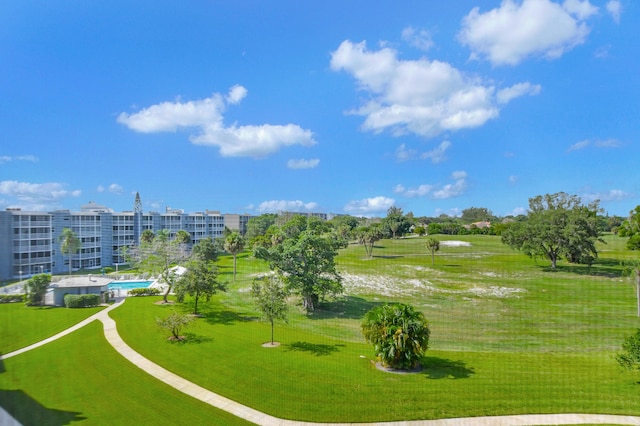 view of community featuring a lawn