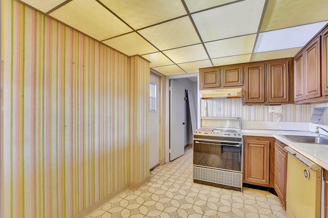 kitchen featuring sink, white appliances, and light tile patterned floors