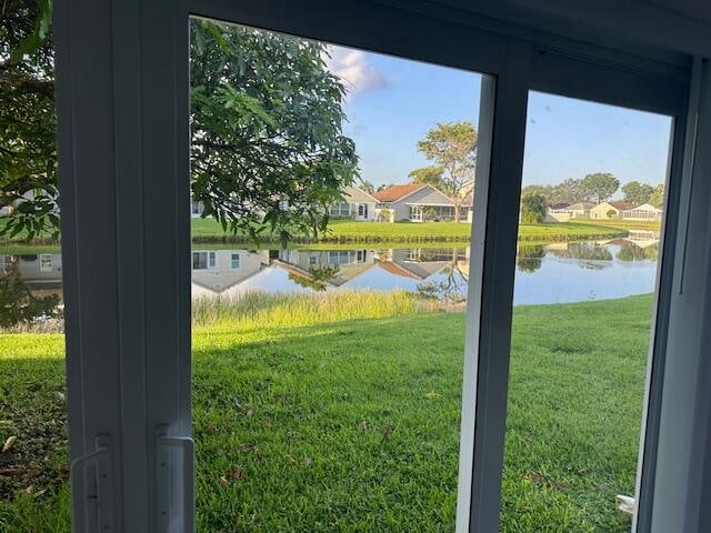 doorway with a water view