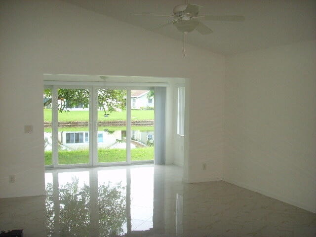 spare room featuring ceiling fan