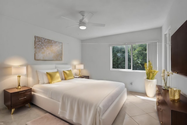 bedroom featuring light tile patterned flooring and ceiling fan