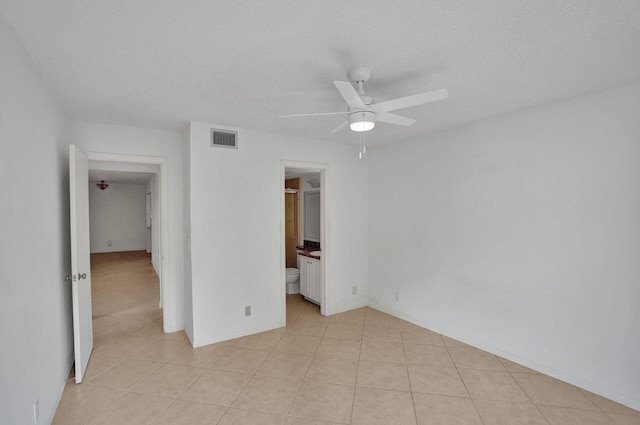 442 Pine Glen Ln Unit B2, Greenacres, FL 33463 - unfurnished bedroom featuring visible vents, ceiling fan, light tile patterned floors, and baseboards