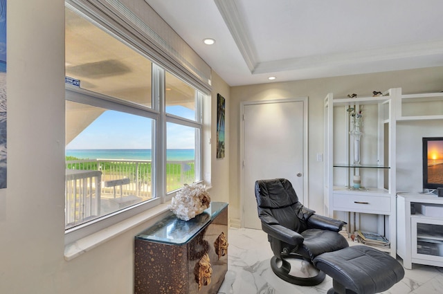 living area with a water view