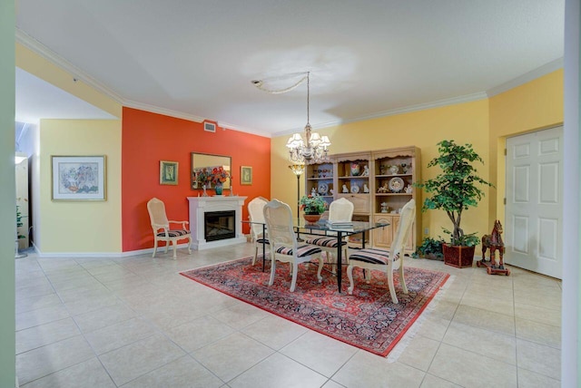 tiled dining room featuring a chandelier and ornamental molding