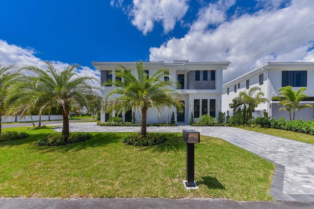 view of front of home with a front yard