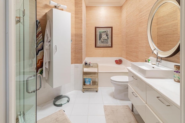 full bathroom featuring toilet, tile patterned flooring, shower with separate bathtub, and vanity