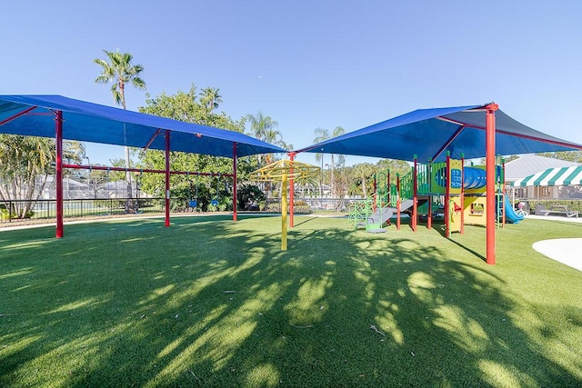 view of playground with a yard