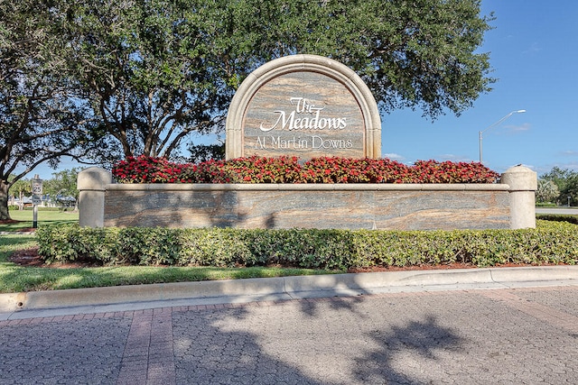 view of community sign