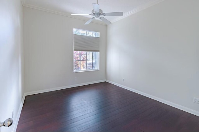 empty room featuring ceiling fan, dark hardwood / wood-style floors, crown molding, and french doors