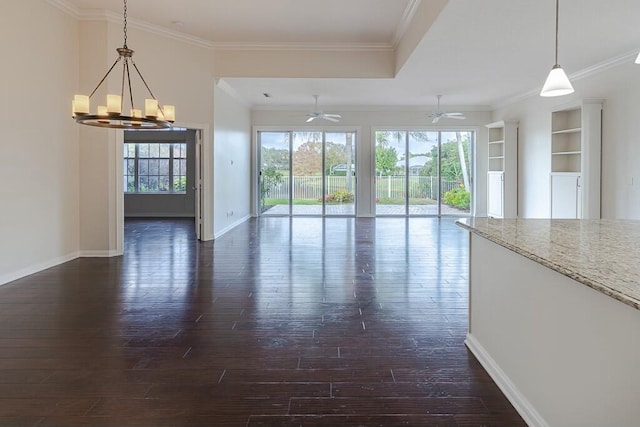 foyer entrance featuring crown molding