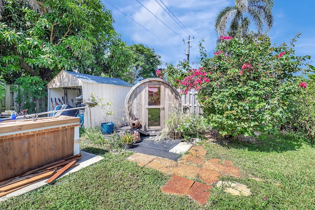 view of yard with a storage shed