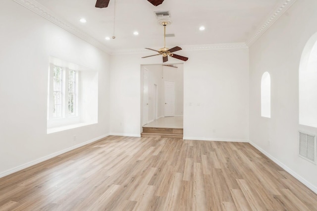 unfurnished room with crown molding, light hardwood / wood-style flooring, and ceiling fan