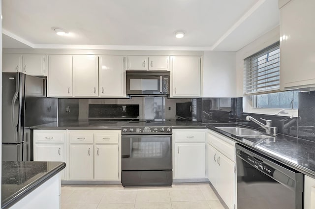 kitchen with tasteful backsplash, white cabinets, sink, black appliances, and light tile patterned flooring