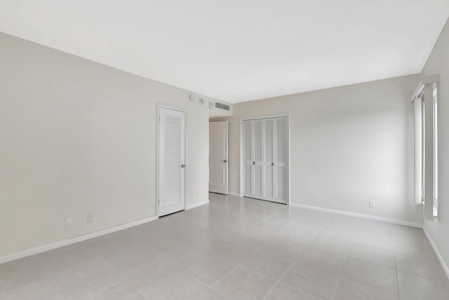 view of tiled spare room