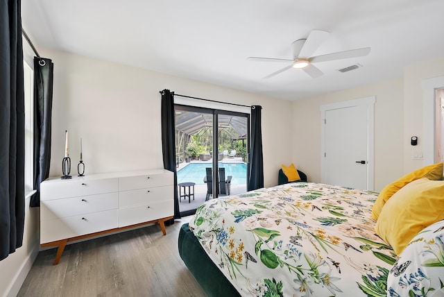 bedroom featuring ceiling fan, access to exterior, and hardwood / wood-style floors