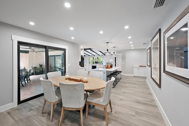 dining room featuring light wood-type flooring