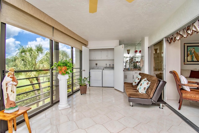 interior space with washer and clothes dryer and a wealth of natural light