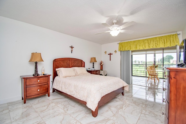 bedroom featuring ceiling fan, light tile patterned flooring, access to exterior, and a textured ceiling