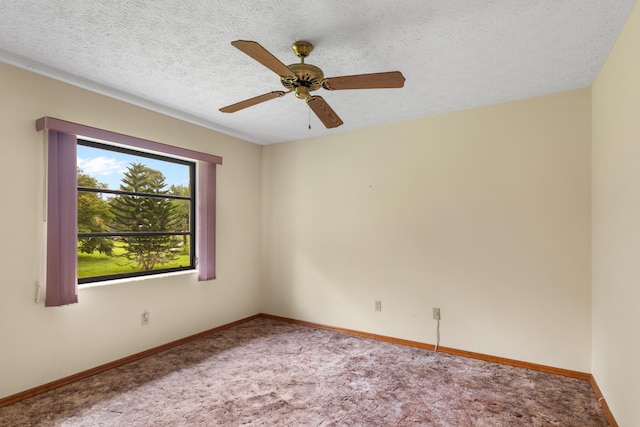 unfurnished room with a textured ceiling, carpet floors, and ceiling fan