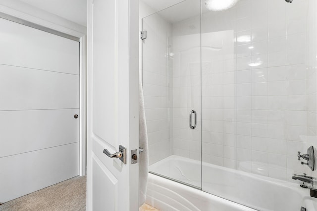 full bathroom featuring combined bath / shower with glass door