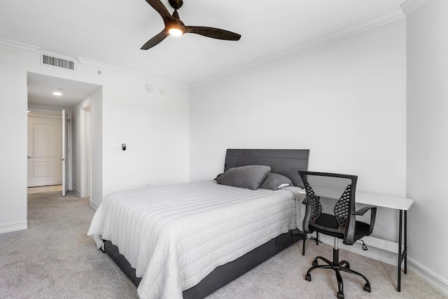 carpeted bedroom with ornamental molding, visible vents, ceiling fan, and baseboards