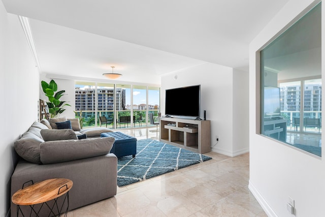 living area featuring floor to ceiling windows, baseboards, and crown molding