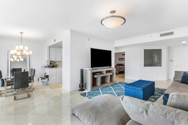 living area featuring a chandelier, baseboards, visible vents, and crown molding