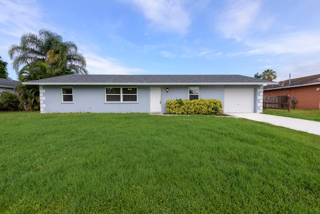 ranch-style house with a front lawn and a garage