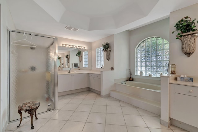 bathroom featuring vanity, tile patterned floors, and independent shower and bath