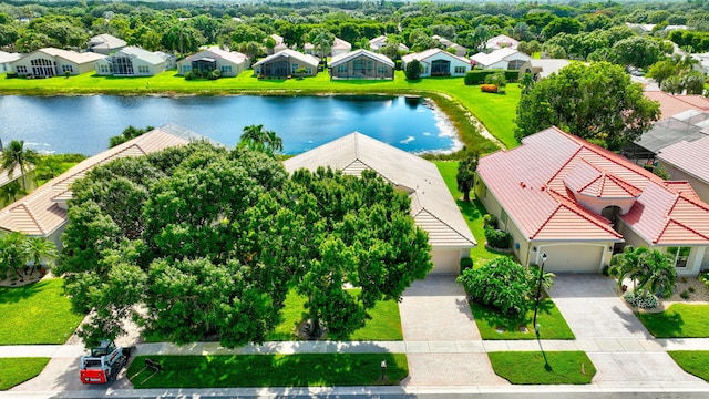 birds eye view of property featuring a water view