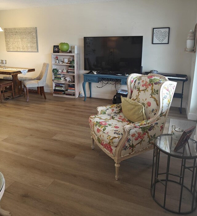 hallway featuring visible vents and dark wood finished floors