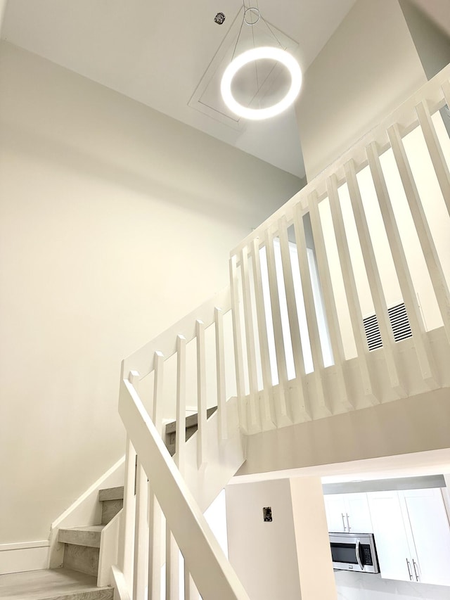 stairs with a towering ceiling