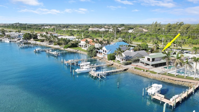 birds eye view of property featuring a water view