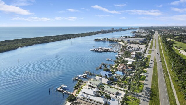 birds eye view of property featuring a water view