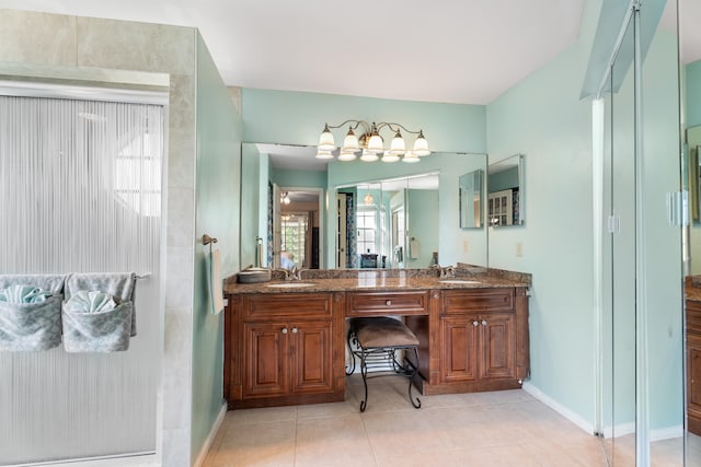 bathroom featuring tile patterned floors and dual vanity