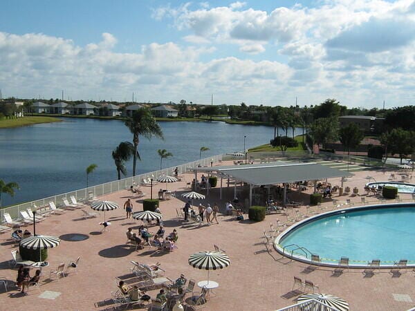 view of pool with a water view