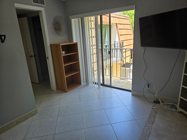 interior space with light tile patterned floors