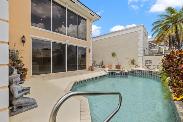 outdoor pool with a patio