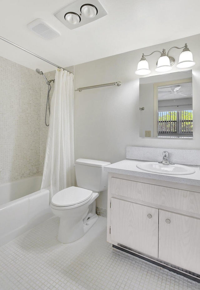 full bathroom featuring shower / tub combo with curtain, vanity, toilet, and tile patterned flooring