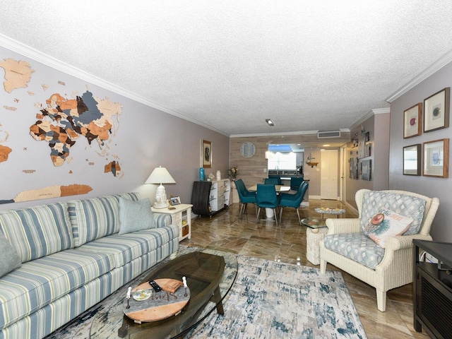 tiled living room with a textured ceiling and crown molding