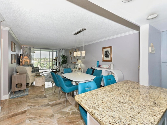 dining space featuring a textured ceiling, crown molding, and light tile patterned floors