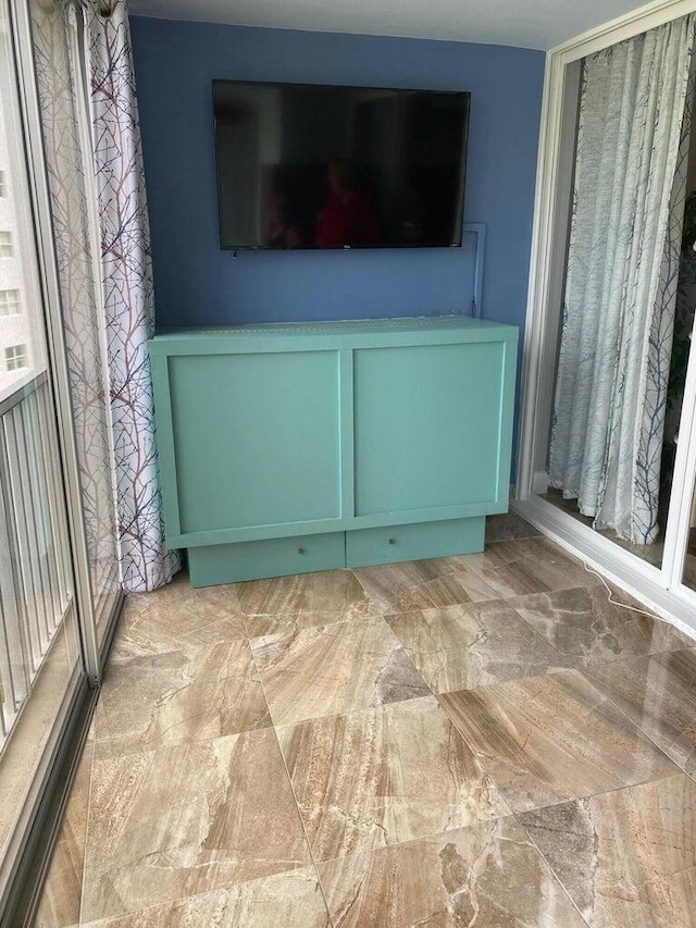 interior space featuring light tile patterned flooring