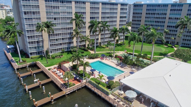 view of pool with a dock