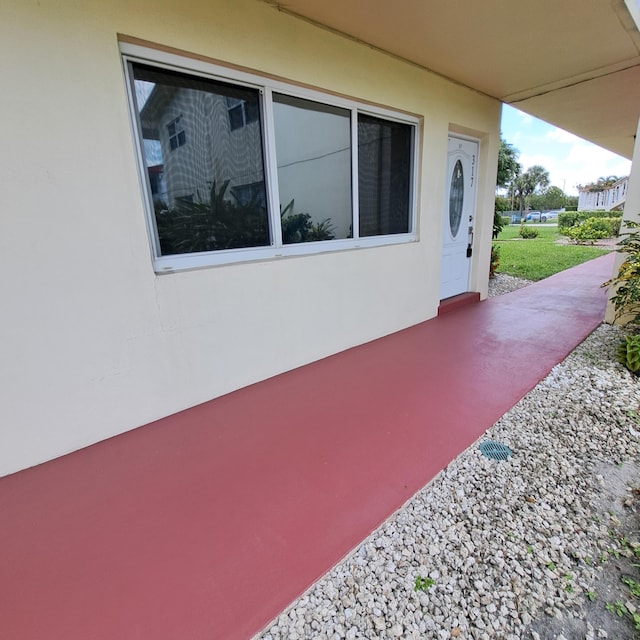 view of property exterior with a patio