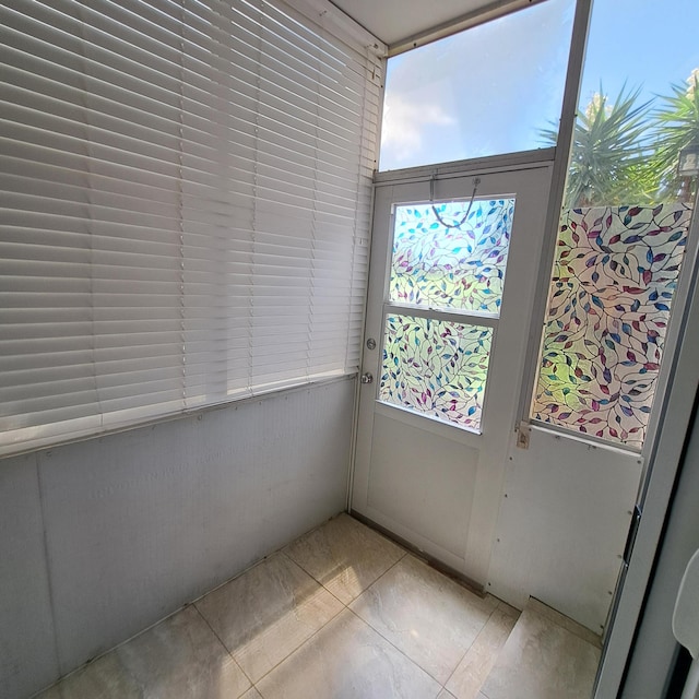 spare room with light tile patterned floors