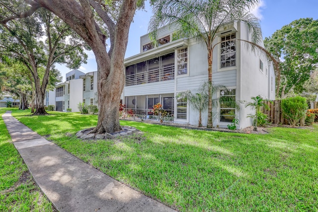 view of front of property with a front lawn