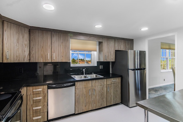 3475 S Ocean Blvd Unit 2160, Palm Beach, FL 33480 - kitchen with appliances with stainless steel finishes, a sink, dark countertops, decorative backsplash, and recessed lighting