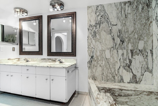 3475 S Ocean Blvd Unit 2160, Palm Beach, FL 33480 - bathroom with double vanity, a marble finish shower, and tile patterned floors