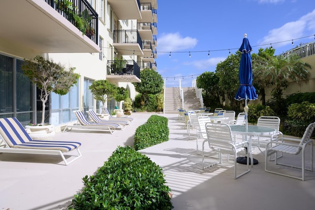 view of patio featuring outdoor dining area